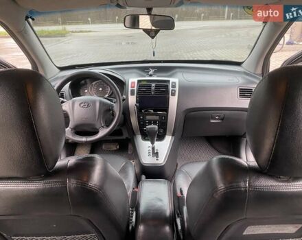 Чорний Хендай Туксон, об'ємом двигуна 1.99 л та пробігом 345 тис. км за 7600 $, фото 4 на Automoto.ua