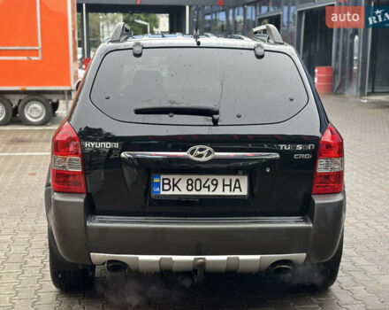 Черный Хендай Туксон, объемом двигателя 2 л и пробегом 327 тыс. км за 7850 $, фото 7 на Automoto.ua