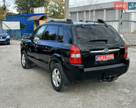 Чорний Хендай Туксон, об'ємом двигуна 2 л та пробігом 180 тис. км за 7999 $, фото 3 на Automoto.ua