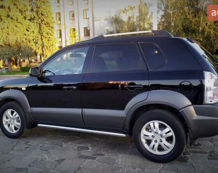 Черный Хендай Туксон, объемом двигателя 2 л и пробегом 230 тыс. км за 8600 $, фото 7 на Automoto.ua