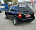 Чорний Хендай Туксон, об'ємом двигуна 2 л та пробігом 180 тис. км за 7999 $, фото 3 на Automoto.ua