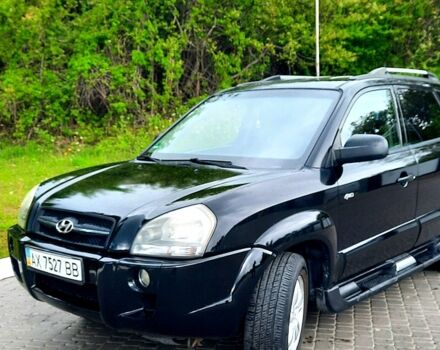 Черный Хендай Туксон, объемом двигателя 2 л и пробегом 175 тыс. км за 8900 $, фото 1 на Automoto.ua