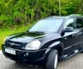 Черный Хендай Туксон, объемом двигателя 2 л и пробегом 175 тыс. км за 8900 $, фото 1 на Automoto.ua