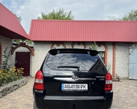 Чорний Хендай Туксон, об'ємом двигуна 2 л та пробігом 275 тис. км за 9500 $, фото 4 на Automoto.ua