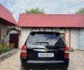 Чорний Хендай Туксон, об'ємом двигуна 2 л та пробігом 275 тис. км за 9500 $, фото 4 на Automoto.ua