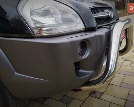 Чорний Хендай Туксон, об'ємом двигуна 2 л та пробігом 229 тис. км за 8600 $, фото 63 на Automoto.ua