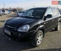 Черный Хендай Туксон, объемом двигателя 2 л и пробегом 180 тыс. км за 9200 $, фото 1 на Automoto.ua