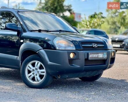 Черный Хендай Туксон, объемом двигателя 2 л и пробегом 227 тыс. км за 8200 $, фото 8 на Automoto.ua