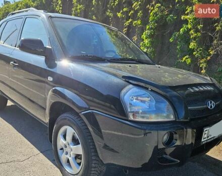 Чорний Хендай Туксон, об'ємом двигуна 2 л та пробігом 152 тис. км за 7950 $, фото 1 на Automoto.ua