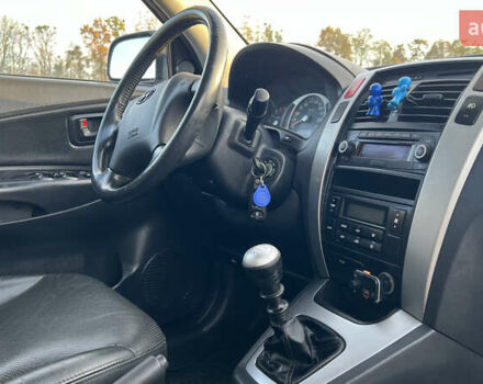 Черный Хендай Туксон, объемом двигателя 1.98 л и пробегом 243 тыс. км за 8500 $, фото 25 на Automoto.ua