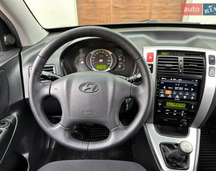 Хендай Туксон 2007 в Ужгороде на Automoto.ua Черный Хендай Туксон, объемом двигателя 1.98 л и пробегом 157 тыс. км за 7300 $, фото 34 на Automoto.ua