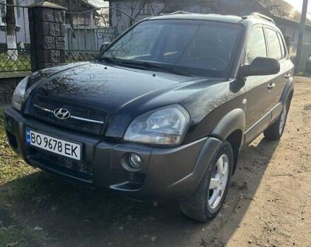 Черный Хендай Туксон, объемом двигателя 1.99 л и пробегом 302 тыс. км за 6900 $, фото 11 на Automoto.ua