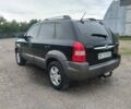 Черный Хендай Туксон, объемом двигателя 2 л и пробегом 160 тыс. км за 7600 $, фото 5 на Automoto.ua