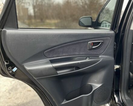 Черный Хендай Туксон, объемом двигателя 2 л и пробегом 330 тыс. км за 4350 $, фото 15 на Automoto.ua