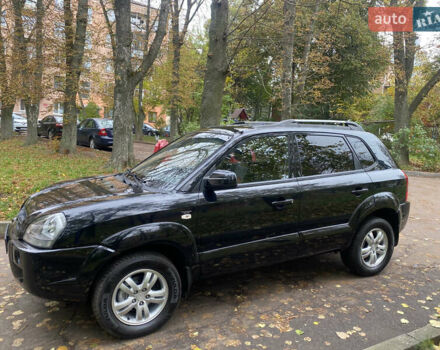 Черный Хендай Туксон, объемом двигателя 2 л и пробегом 178 тыс. км за 7860 $, фото 6 на Automoto.ua