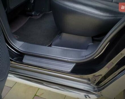 Чорний Хендай Туксон, об'ємом двигуна 2 л та пробігом 229 тис. км за 8600 $, фото 143 на Automoto.ua