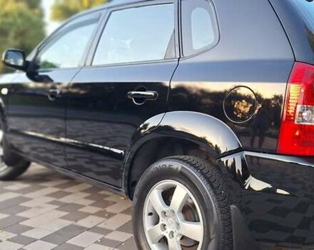 Черный Хендай Туксон, объемом двигателя 2 л и пробегом 190 тыс. км за 8150 $, фото 22 на Automoto.ua
