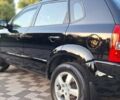Черный Хендай Туксон, объемом двигателя 2 л и пробегом 190 тыс. км за 8150 $, фото 22 на Automoto.ua
