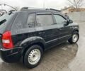 Черный Хендай Туксон, объемом двигателя 2 л и пробегом 177 тыс. км за 8500 $, фото 3 на Automoto.ua