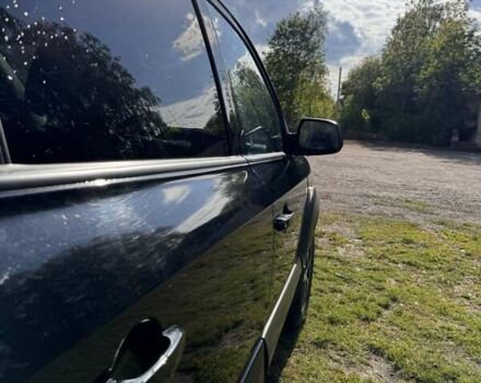 Чорний Хендай Туксон, об'ємом двигуна 2 л та пробігом 186 тис. км за 8099 $, фото 2 на Automoto.ua