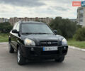 Черный Хендай Туксон, объемом двигателя 2 л и пробегом 300 тыс. км за 7350 $, фото 22 на Automoto.ua
