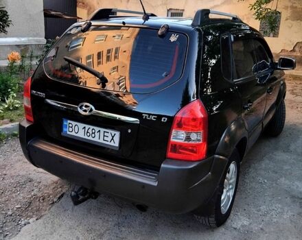 Черный Хендай Туксон, объемом двигателя 2 л и пробегом 270 тыс. км за 7400 $, фото 5 на Automoto.ua