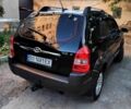 Черный Хендай Туксон, объемом двигателя 2 л и пробегом 270 тыс. км за 7400 $, фото 5 на Automoto.ua