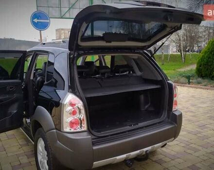 Чорний Хендай Туксон, об'ємом двигуна 2 л та пробігом 229 тис. км за 8600 $, фото 92 на Automoto.ua