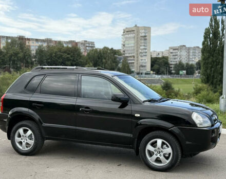 Черный Хендай Туксон, объемом двигателя 2 л и пробегом 300 тыс. км за 7350 $, фото 28 на Automoto.ua