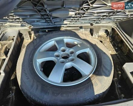 Чорний Хендай Туксон, об'ємом двигуна 2 л та пробігом 152 тис. км за 7950 $, фото 10 на Automoto.ua