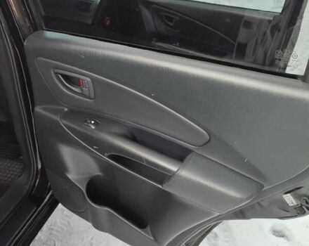 Черный Хендай Туксон, объемом двигателя 1.98 л и пробегом 335 тыс. км за 7800 $, фото 8 на Automoto.ua