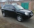Чорний Хендай Туксон, об'ємом двигуна 2 л та пробігом 246 тис. км за 8100 $, фото 1 на Automoto.ua
