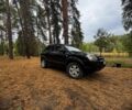 Черный Хендай Туксон, объемом двигателя 2 л и пробегом 240 тыс. км за 8800 $, фото 4 на Automoto.ua