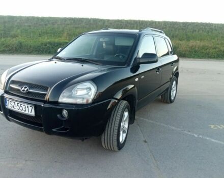 Черный Хендай Туксон, объемом двигателя 2 л и пробегом 240 тыс. км за 2700 $, фото 6 на Automoto.ua