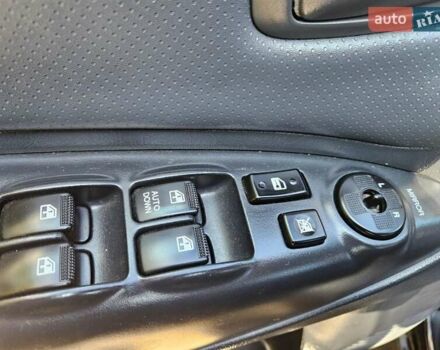 Чорний Хендай Туксон, об'ємом двигуна 2 л та пробігом 152 тис. км за 7950 $, фото 12 на Automoto.ua