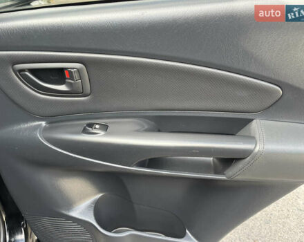 Черный Хендай Туксон, объемом двигателя 2 л и пробегом 256 тыс. км за 7800 $, фото 10 на Automoto.ua