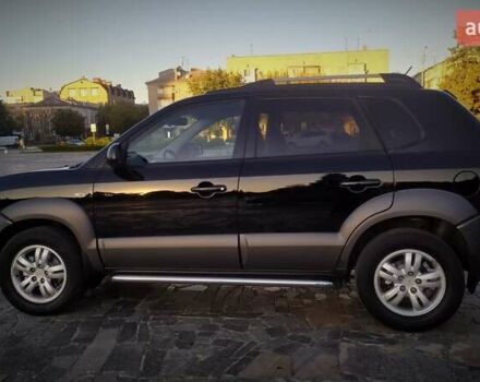 Черный Хендай Туксон, объемом двигателя 2 л и пробегом 230 тыс. км за 8600 $, фото 10 на Automoto.ua