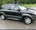 Черный Хендай Туксон, объемом двигателя 2 л и пробегом 190 тыс. км за 8500 $, фото 1 на Automoto.ua