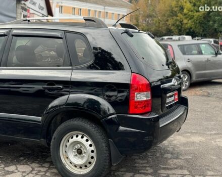 Черный Хендай Туксон, объемом двигателя 2 л и пробегом 177 тыс. км за 8940 $, фото 9 на Automoto.ua