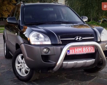 Черный Хендай Туксон, объемом двигателя 2 л и пробегом 230 тыс. км за 8600 $, фото 93 на Automoto.ua