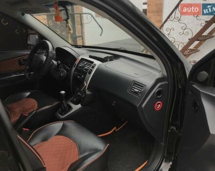 Черный Хендай Туксон, объемом двигателя 2 л и пробегом 210 тыс. км за 8999 $, фото 55 на Automoto.ua