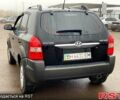 Чорний Хендай Туксон, об'ємом двигуна 2 л та пробігом 154 тис. км за 7400 $, фото 1 на Automoto.ua