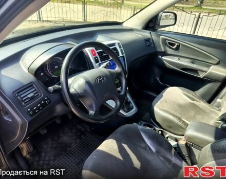 Чорний Хендай Туксон, об'ємом двигуна 2 л та пробігом 350 тис. км за 7500 $, фото 8 на Automoto.ua