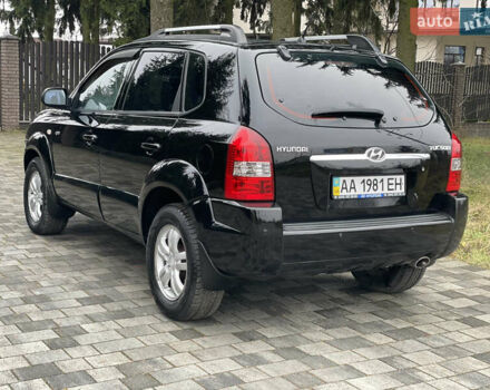 Черный Хендай Туксон, объемом двигателя 2 л и пробегом 180 тыс. км за 7700 $, фото 15 на Automoto.ua
