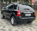 Черный Хендай Туксон, объемом двигателя 2 л и пробегом 180 тыс. км за 7700 $, фото 15 на Automoto.ua
