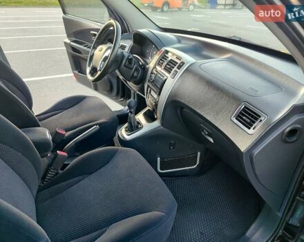 Черный Хендай Туксон, объемом двигателя 2 л и пробегом 280 тыс. км за 6700 $, фото 15 на Automoto.ua