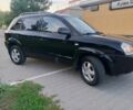 Черный Хендай Туксон, объемом двигателя 2 л и пробегом 192 тыс. км за 7950 $, фото 2 на Automoto.ua