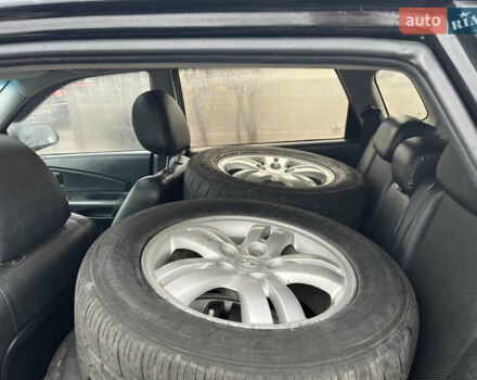 Чорний Хендай Туксон, об'ємом двигуна 1.98 л та пробігом 177 тис. км за 8500 $, фото 8 на Automoto.ua