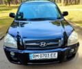 Черный Хендай Туксон, объемом двигателя 2 л и пробегом 270 тыс. км за 7800 $, фото 1 на Automoto.ua