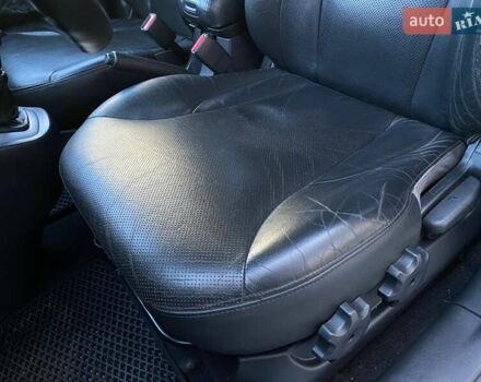 Черный Хендай Туксон, объемом двигателя 1.98 л и пробегом 286 тыс. км за 7300 $, фото 30 на Automoto.ua